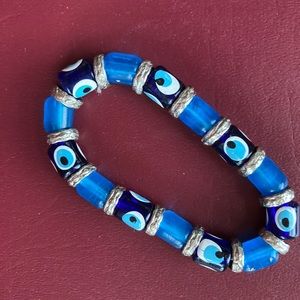 NWOT Blue “The Eye” bracelets large size